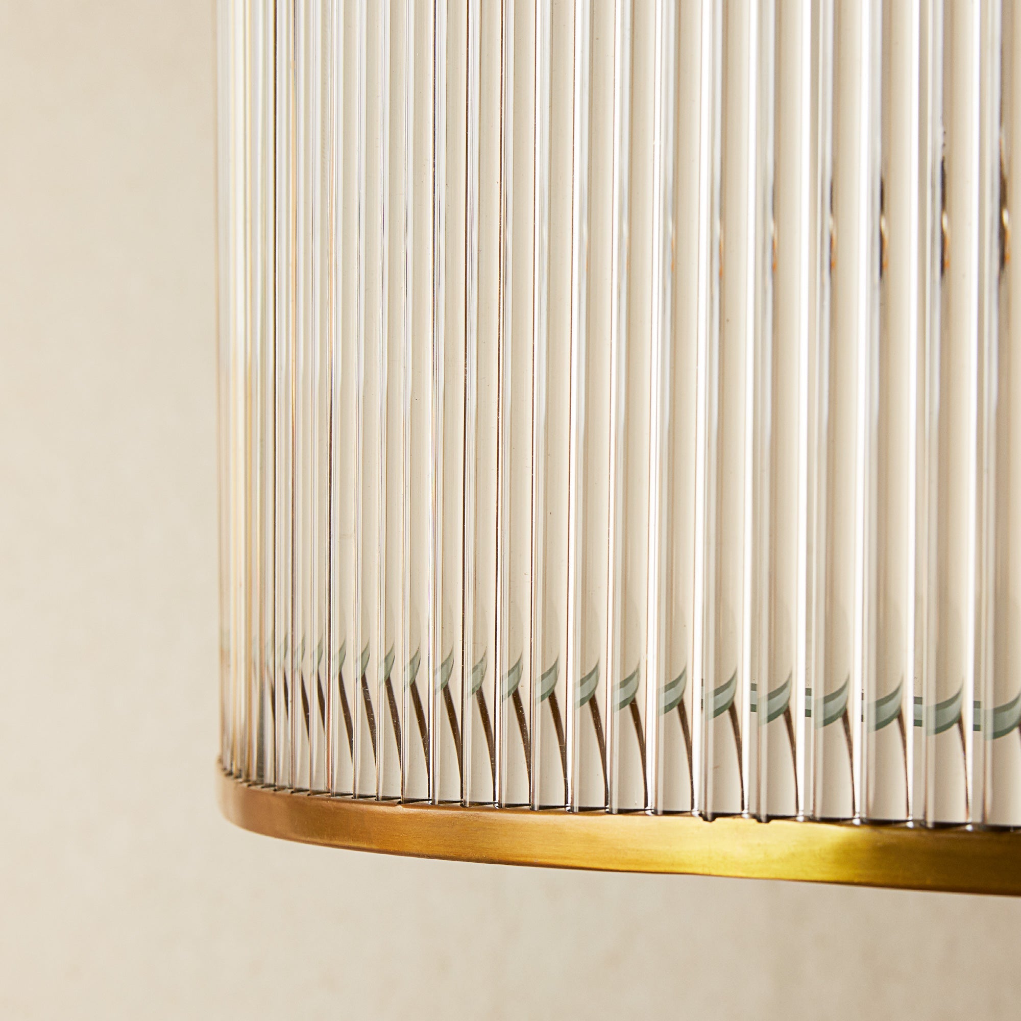 Artemis circular chandelier in brass with glass rods and frosted glass baffle