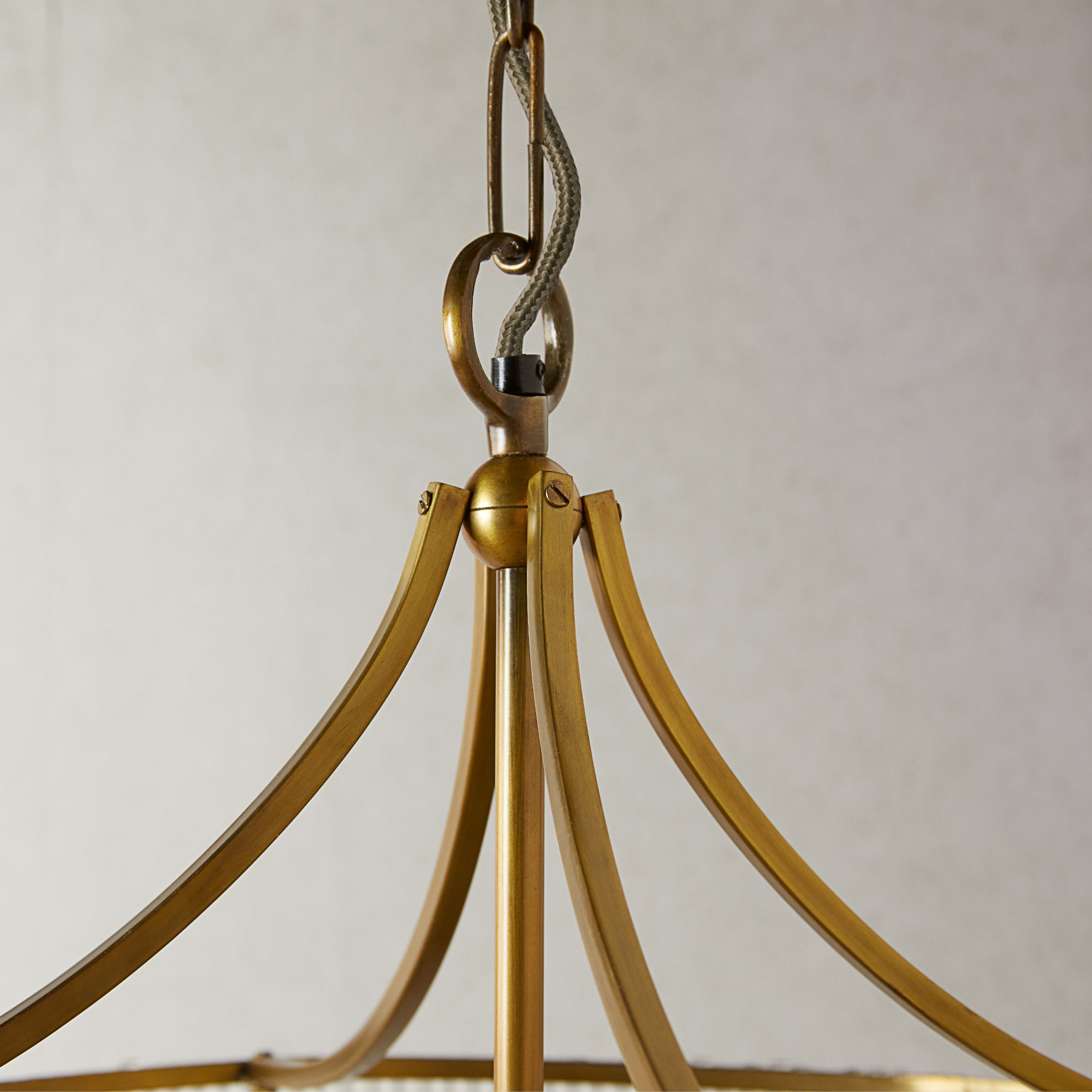 Artemis circular chandelier in brass with glass rods and frosted glass baffle