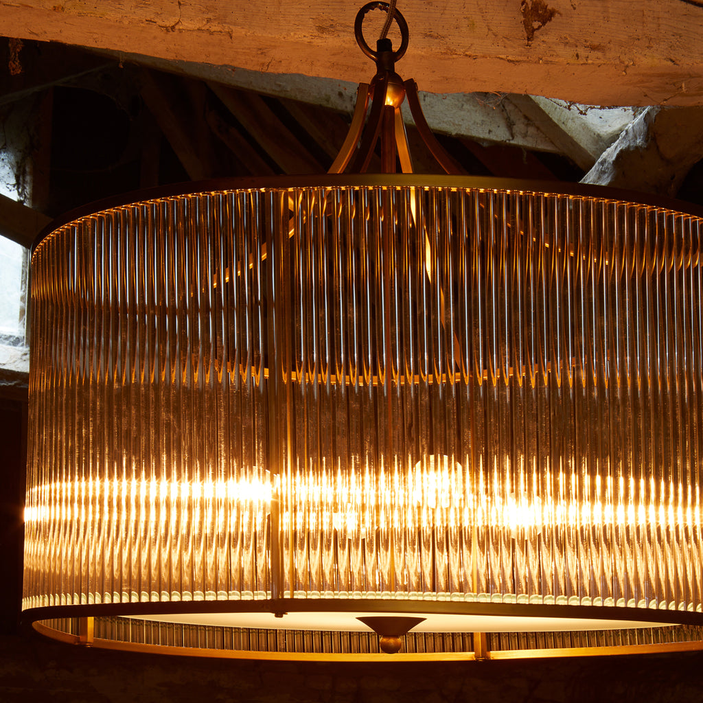 Artemis circular chandelier in brass with glass rods and frosted glass baffle