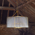 Artemis circular chandelier in brass with glass rods and frosted glass baffle