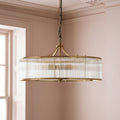 Athena Chandelier in brass with glass rods and frosted glass baffle