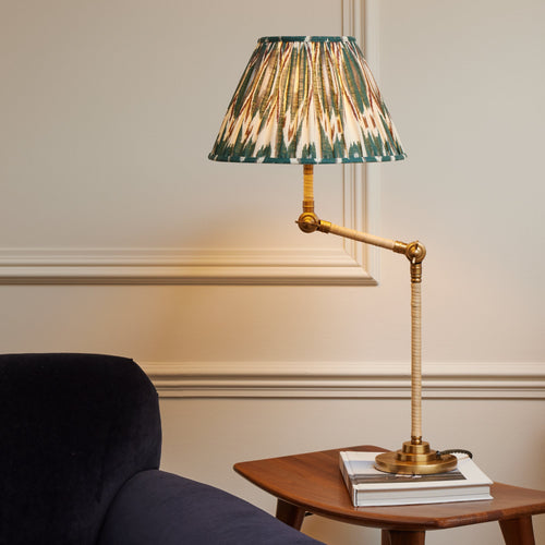 Abel table lamp in brass and natural rattan