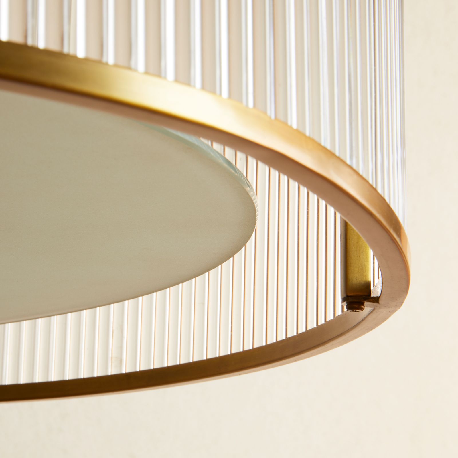 Artemis circular chandelier in brass with glass rods and frosted glass baffle